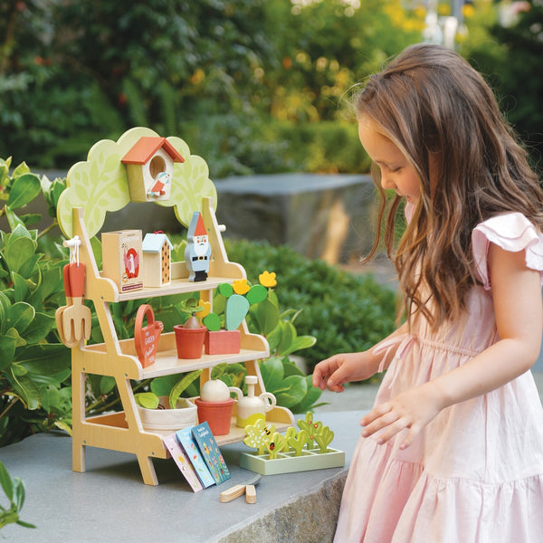 playing outdoors with a garden centre
